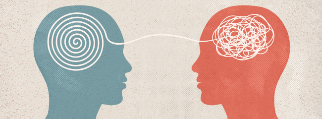 Two faces turned to look at each other. One with a clean twist of string in the brain connecting to the other with a mess causing opposites to attract.